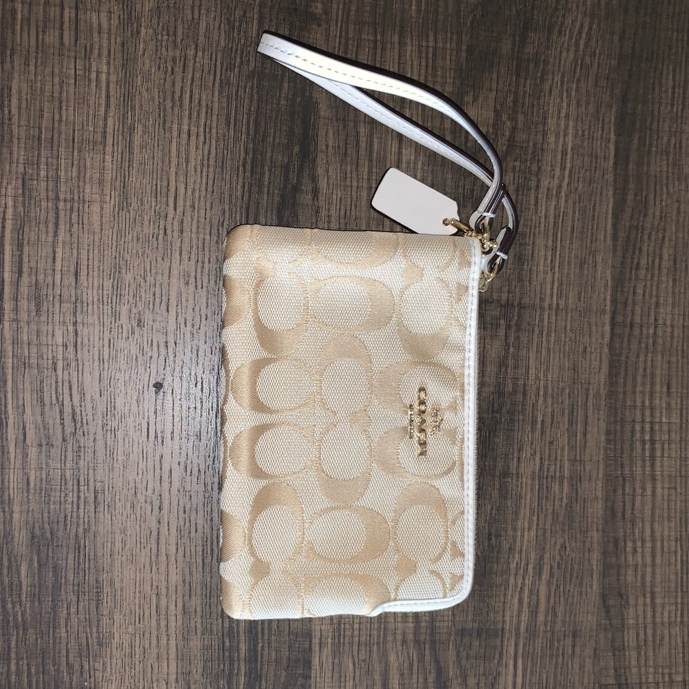 Cream Coach Wristlet